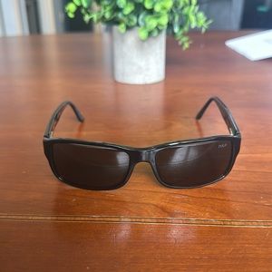 Polo sunglasses. Practically new. With bag. Will be sent in case.